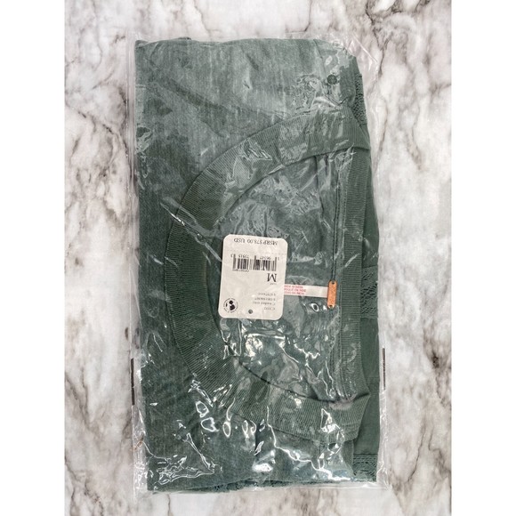 Free People NWT Fall in Love Lace Inset Ruffle Bottom Tee Washed Army Medium New - Picture 8 of 10